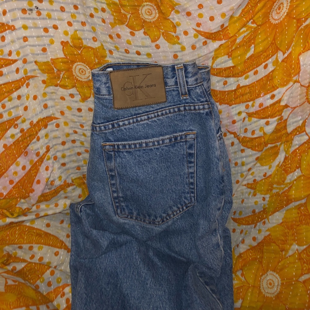 Calvin Klein Jeans with Knee Cutouts 🦋